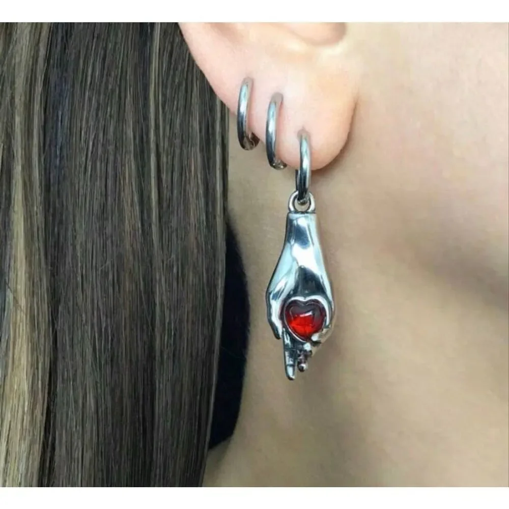 Heart in Hand Huggie Earrings